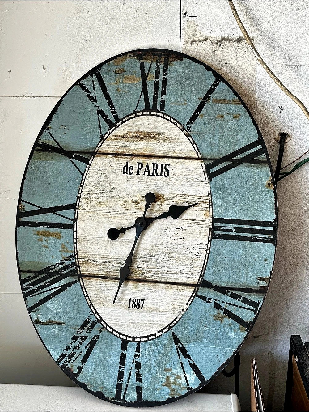Storied Home Vintage Blue Oval Wood Wall Clock